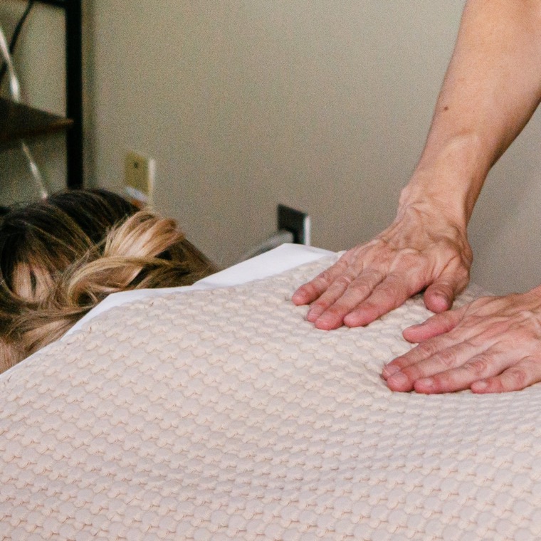 Christy providing a therapeutic massage